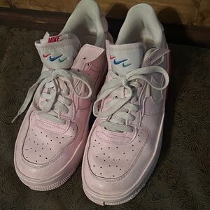 Nike Pink Sneakers with White and Blue Accents